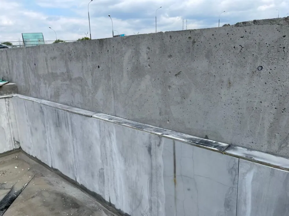 Как и почему нужно утеплять отмостку многоквартирного дома?