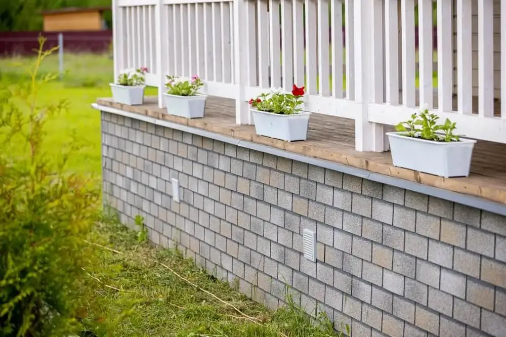 Отделка фасада панелями под кирпич