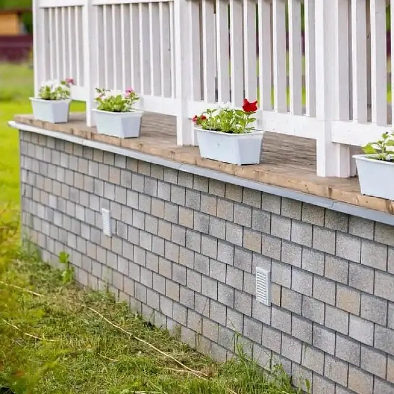 Отделка фасада панелями под кирпич